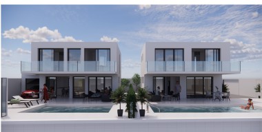 Image grond-om-2-huizen-te-bouwen-vlakbij-het-strand-max-bouwoppervlakte-323m2-huis-met-2-appartementen-om-te-renoveren-vlakbij-het-strand